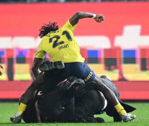 Bright Osayi-Samuel involved in a fight against fans